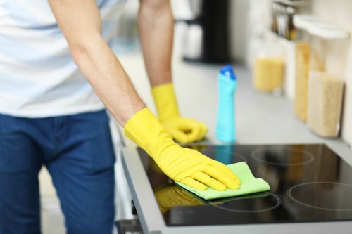 Professional commercial cleaning team maintaining a business restroom