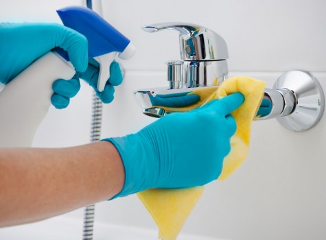 Spot cleaning a rug after a household spill