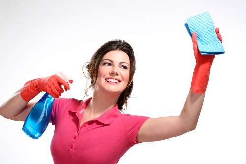 Professional cleaning of kitchen surfaces during move out cleaning