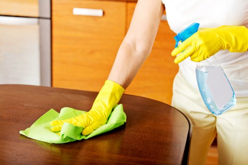 Office cleaning service for desks and shared surfaces